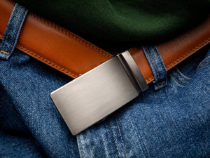 light brown belt with a silver ratchet buckle